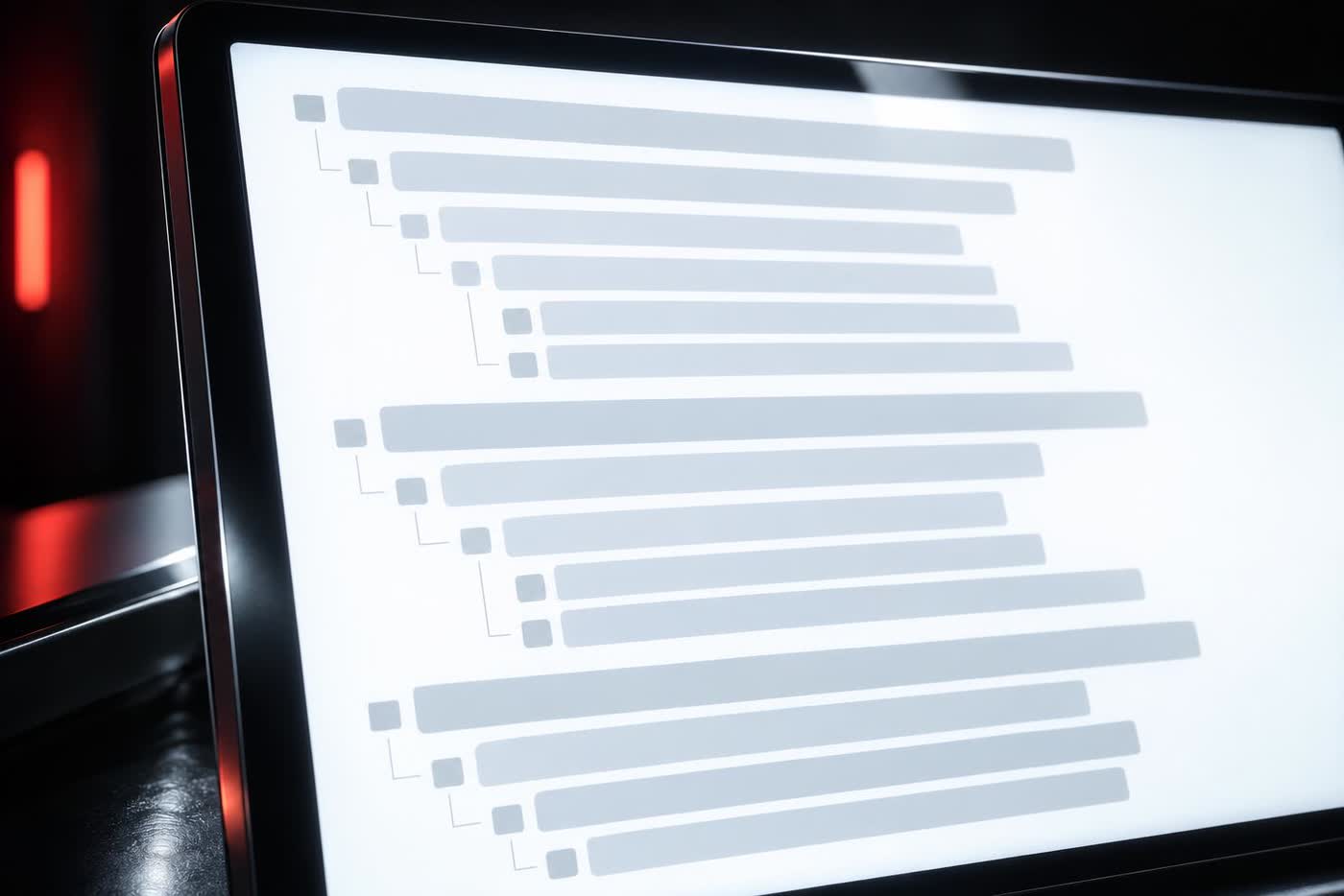 An extreme close up of a bright screen showing dense clean rows of plain structured data, sharp and perfectly legible, glowing in a black room.
